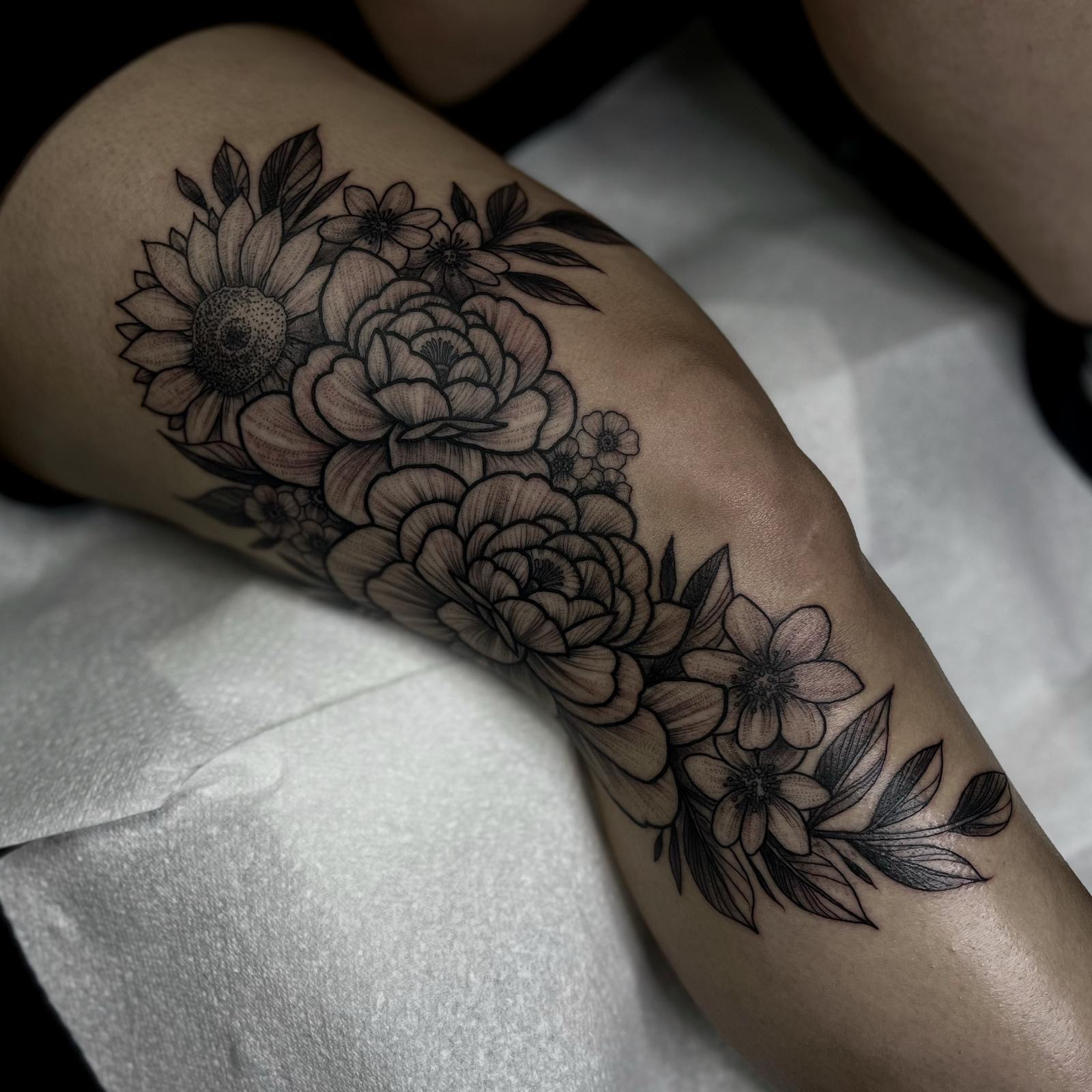 floral knee tattoo