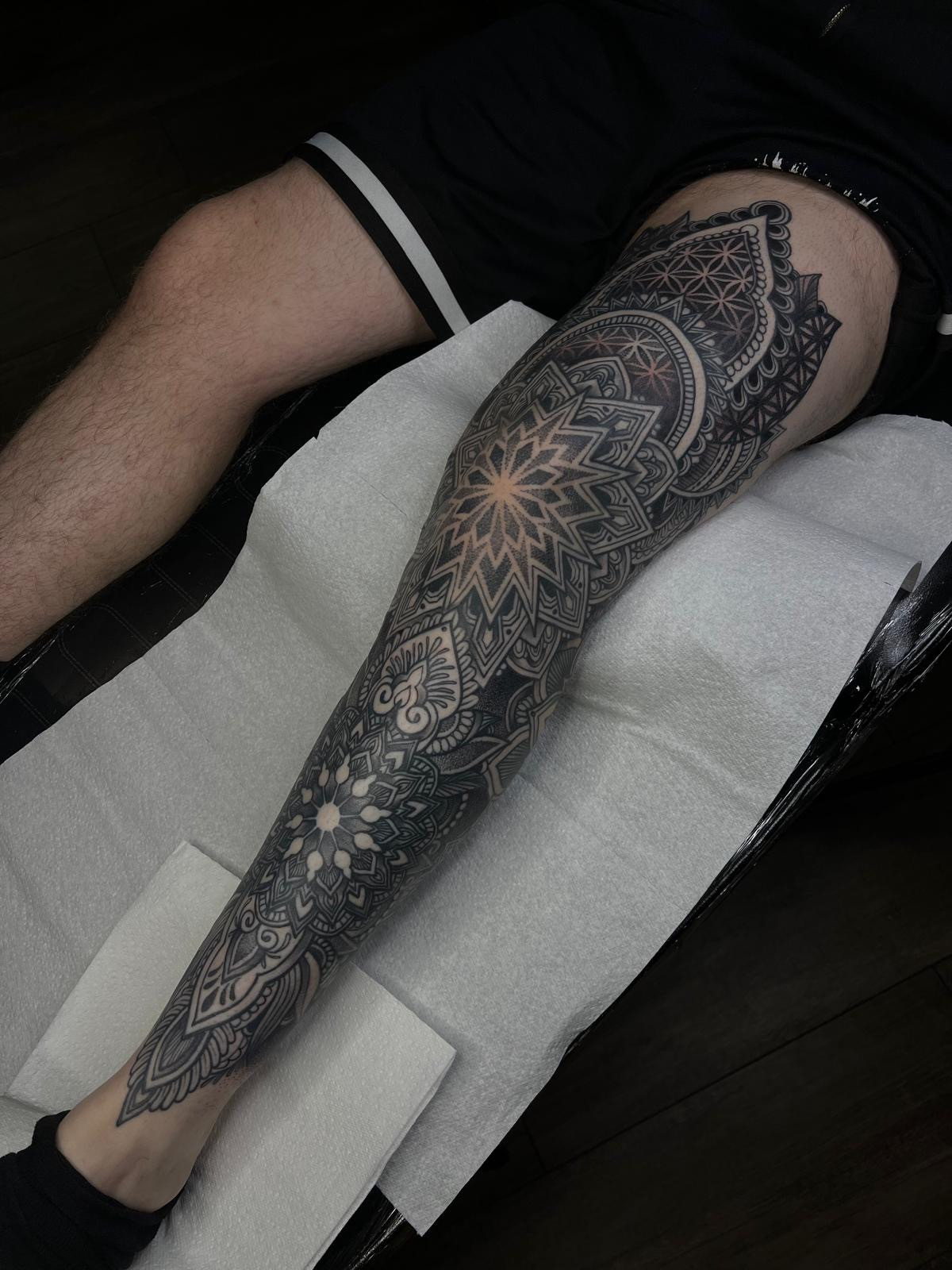 front of leg pattern work tattoo