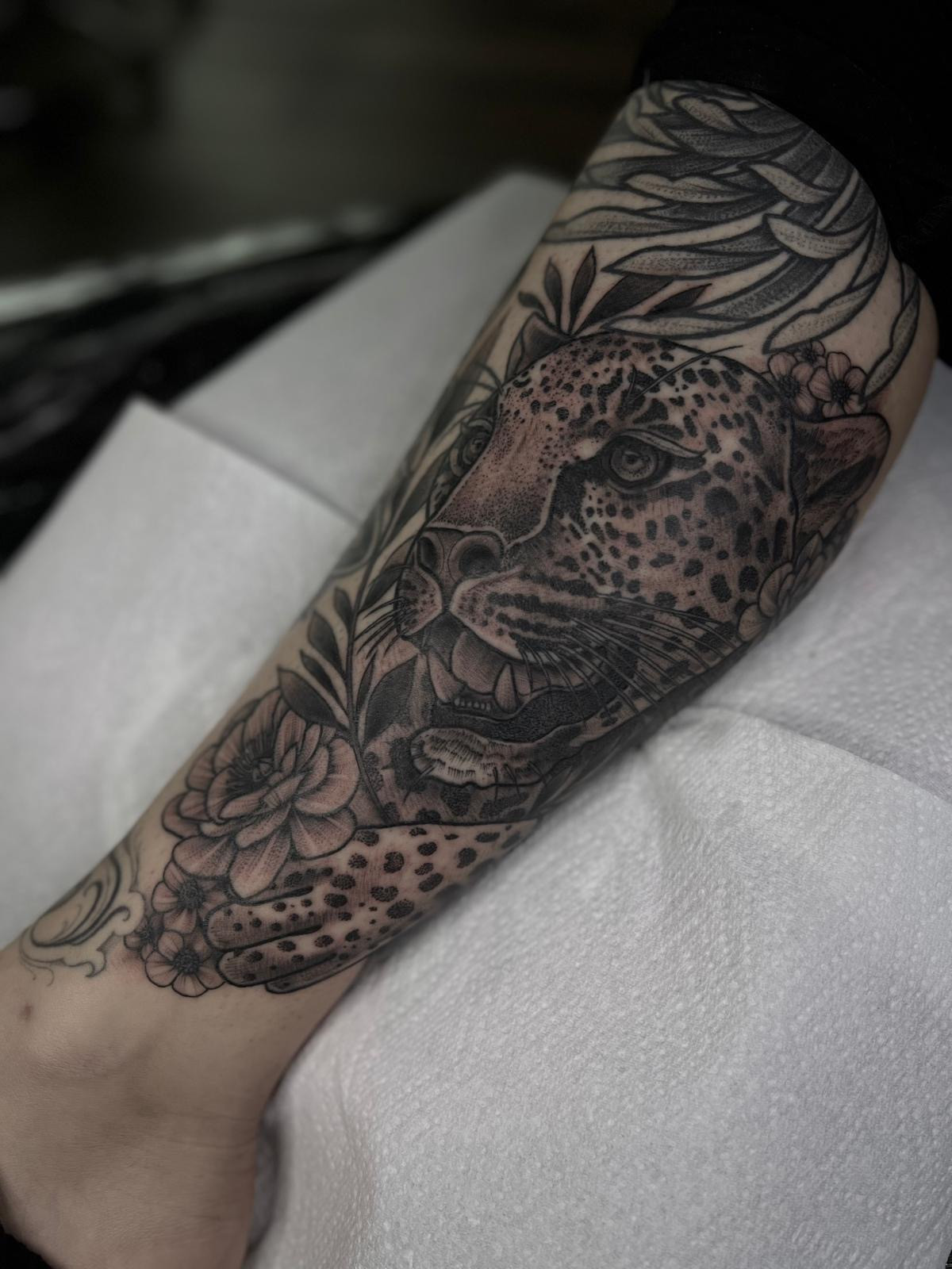 leopard pattern work tattoo