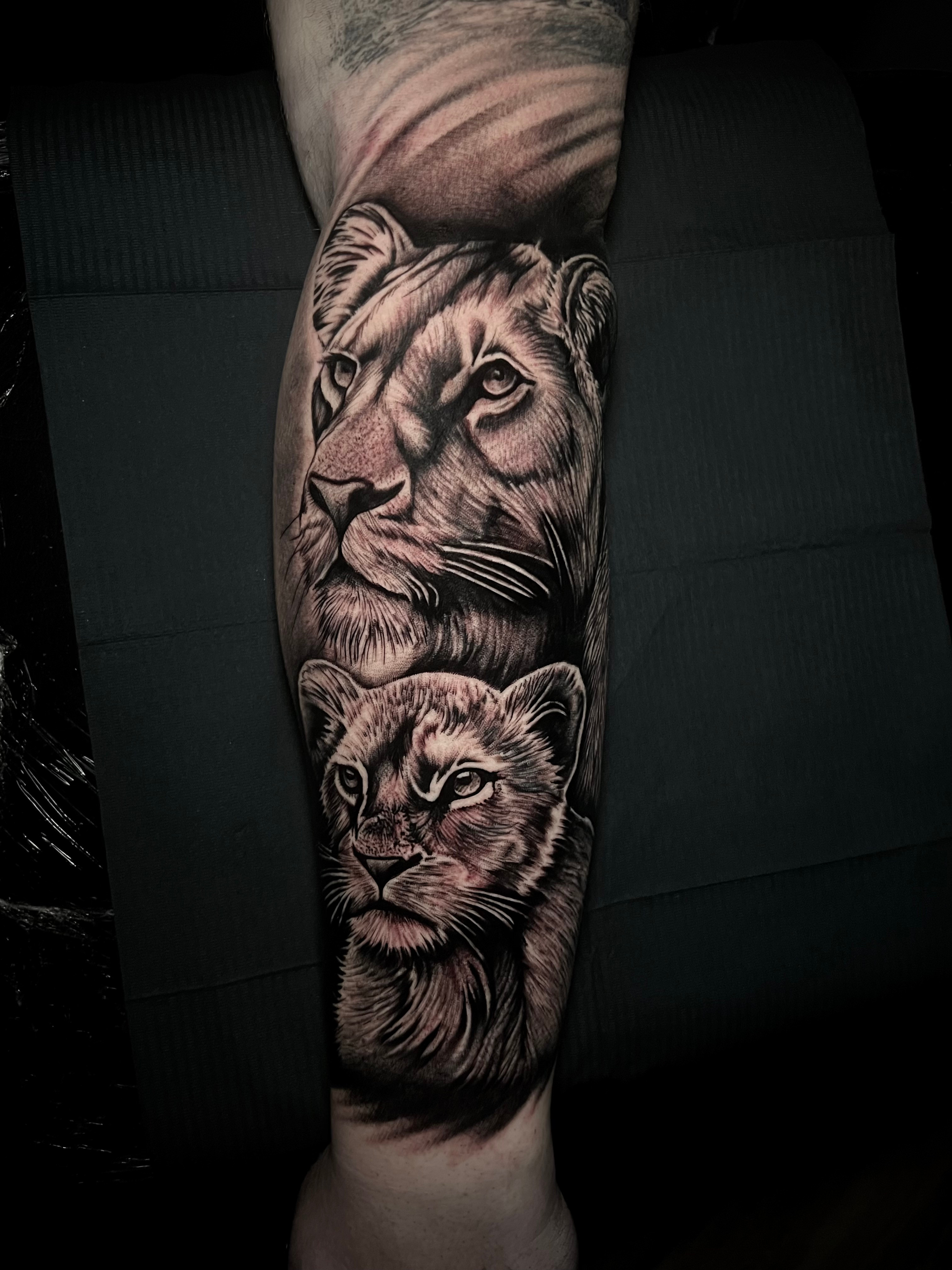 Lioness and cub tattoo